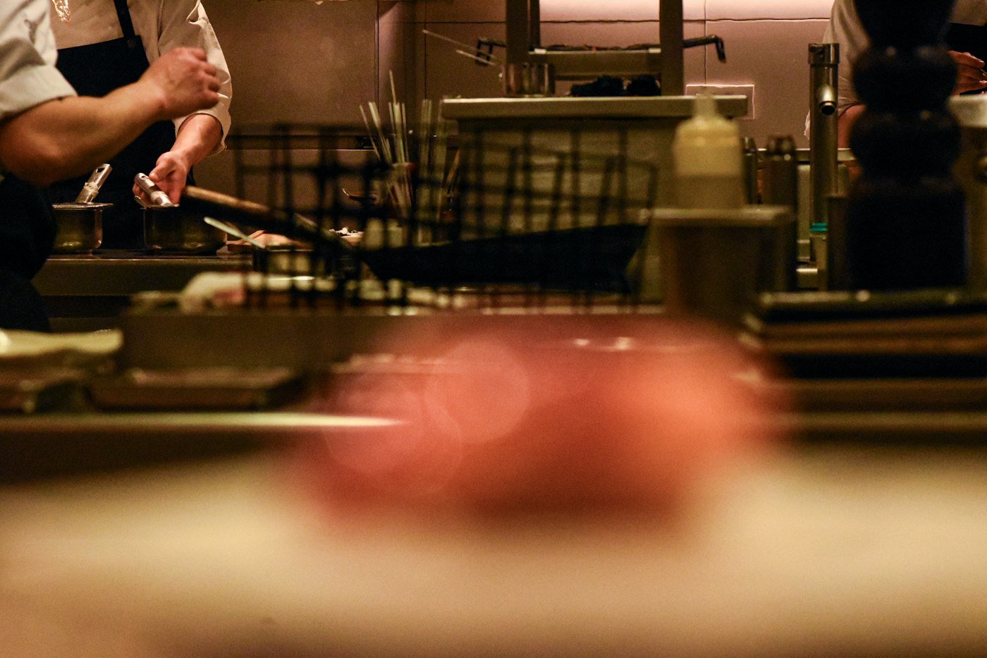 Chefs working during a busy kitchen rush