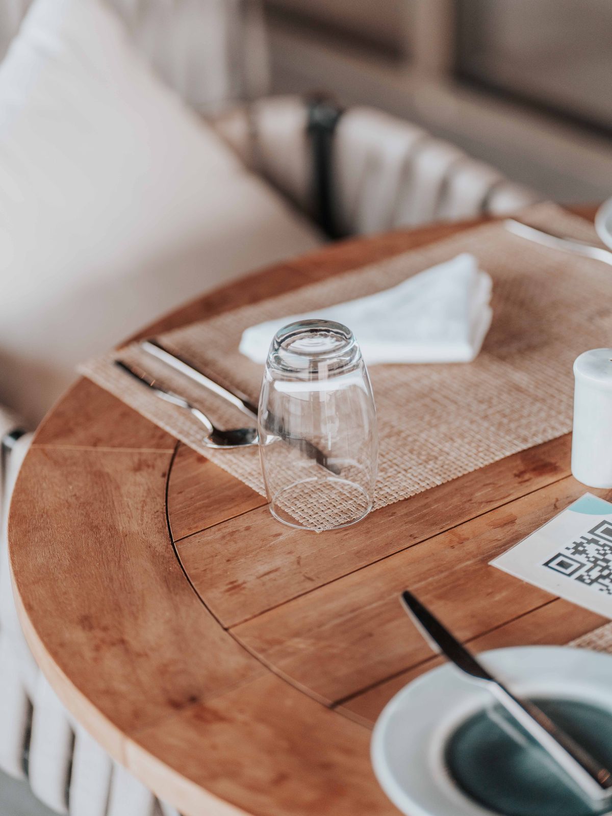 Table set up with a QR code for digital menu ordering